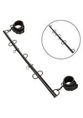 bondage spreader bar featuring swivel d rings and locking pins for customizable positioning during play