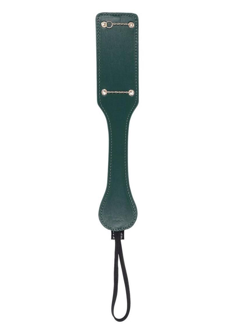 emerald bdsm paddle with gold chain impressions