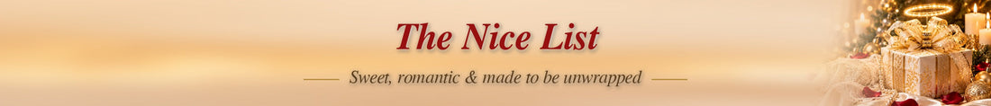 romantic Christmas gifts with lace, pearls, and rose petals beside a white and gold gift box with a glowing halo