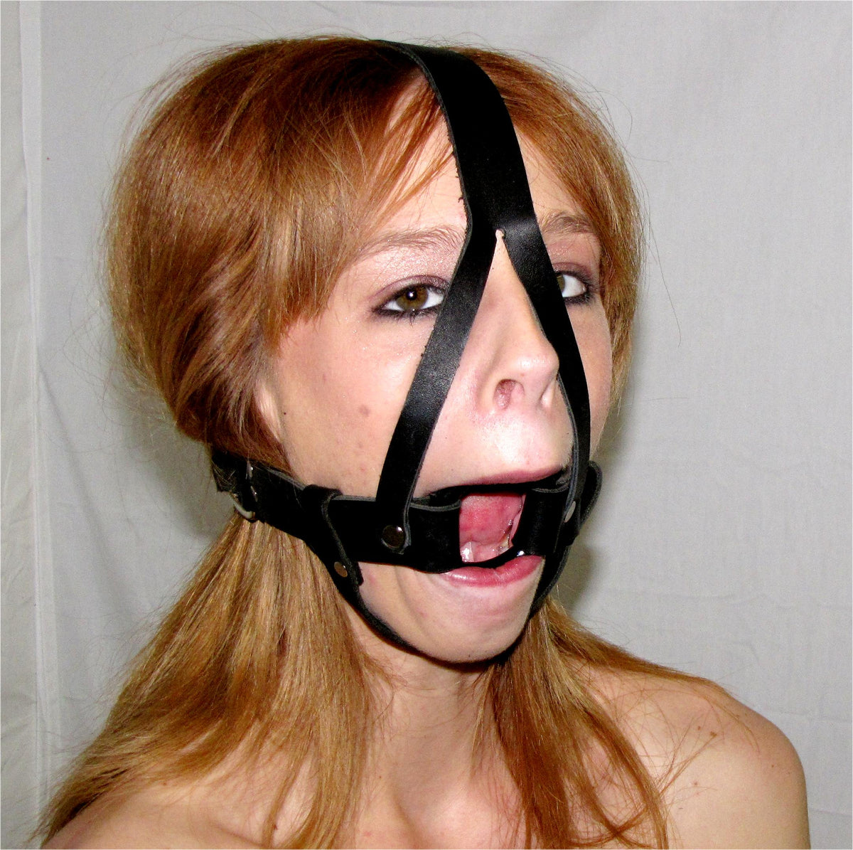 Hard Plastic Ring Gag With Harness