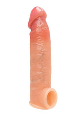 Realistic silicone model of a penis on a white background