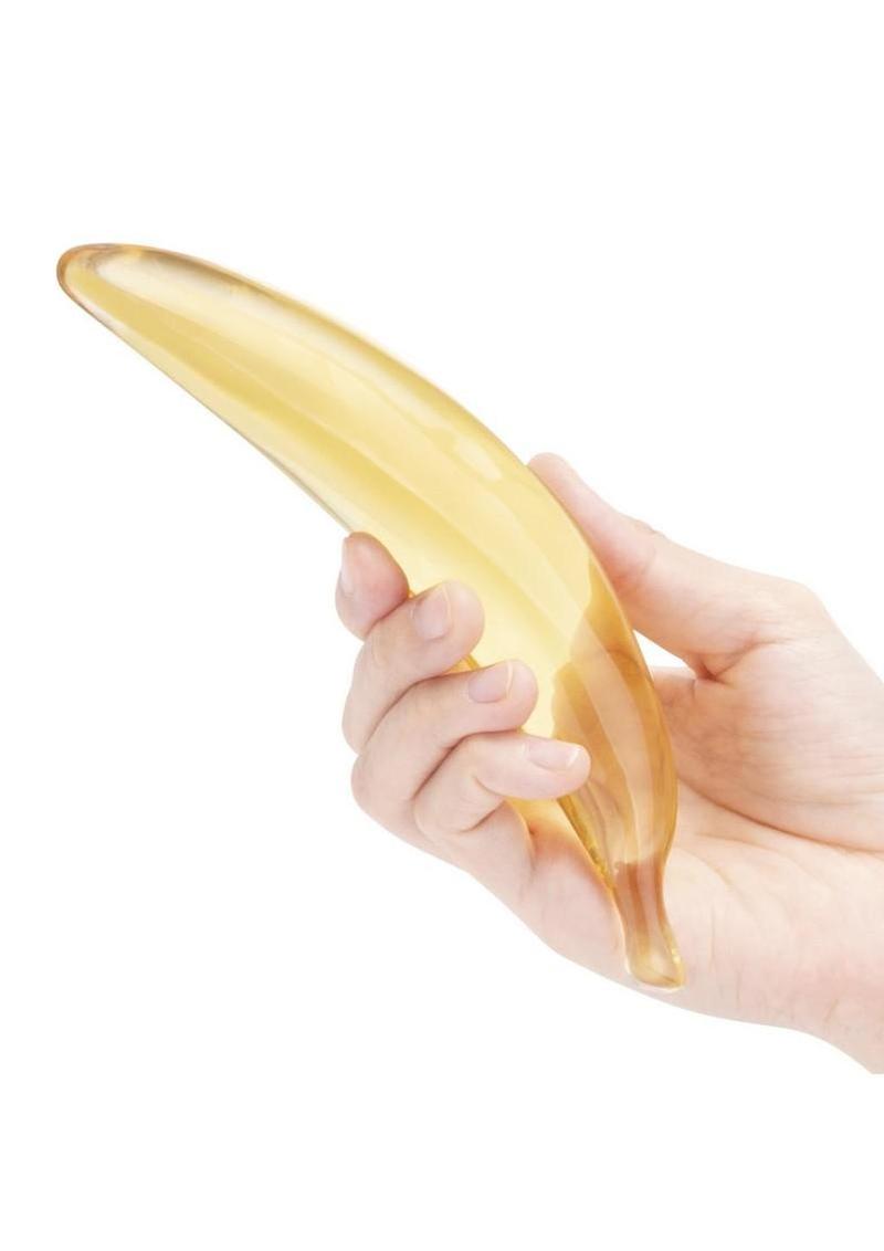 Artistic glass dildo crafted in a realistic banana shape for fun and sensual adventures