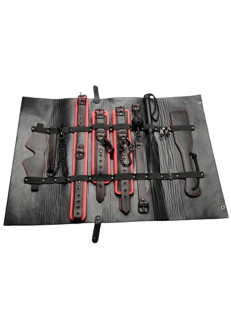 BDSM travel set with restraints paddle and ball gag