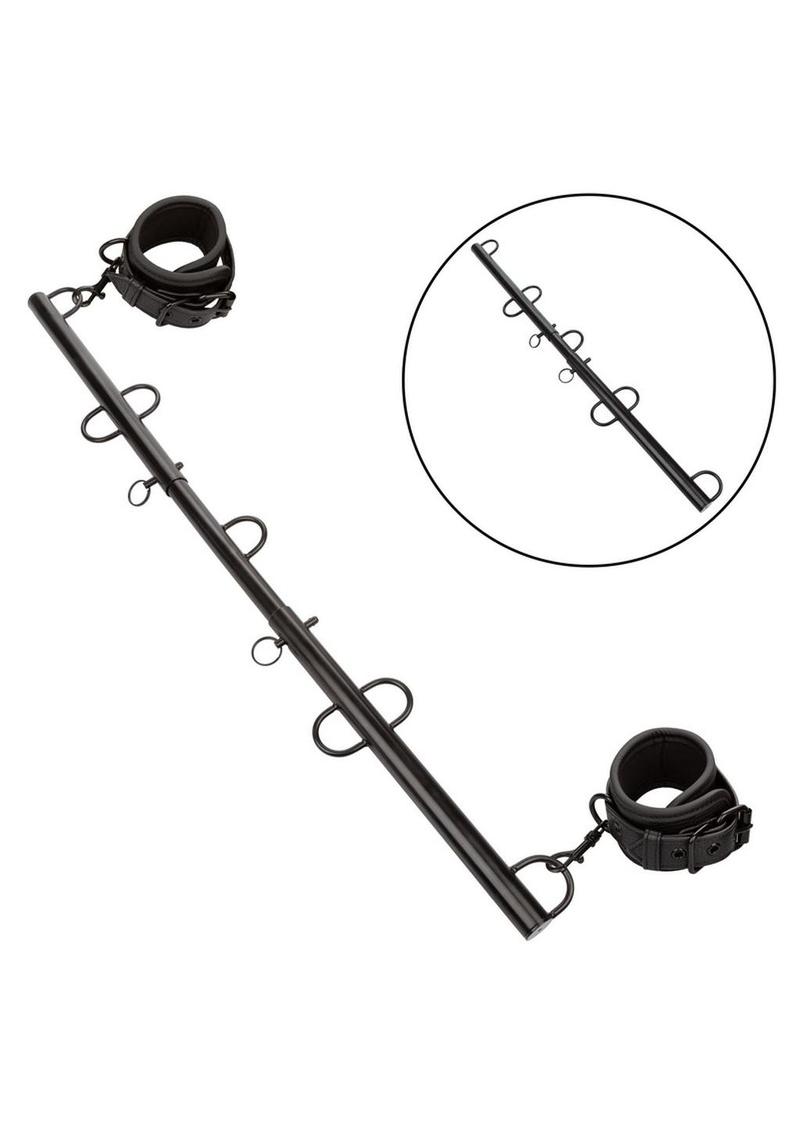 bondage spreader bar featuring swivel d rings and locking pins for customizable positioning during play