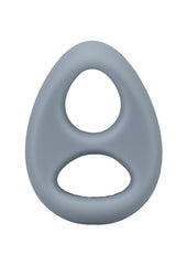 Gray plastic ring with two circular holes on a white background Cock and Ball torture