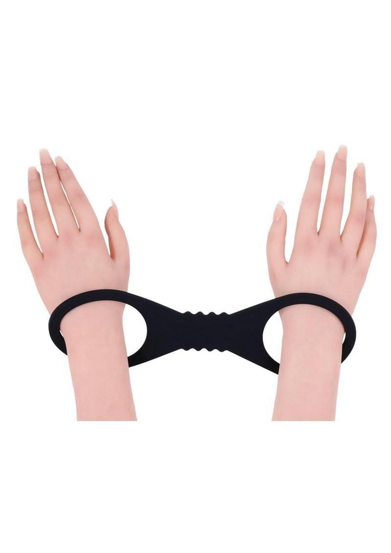 bold black silicone cuffs with soft body safe feel designed for large wrists or ankles during comfortable bdsm bondage play