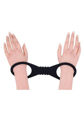 bold black silicone cuffs with soft body safe feel designed for large wrists or ankles during comfortable bdsm bondage play