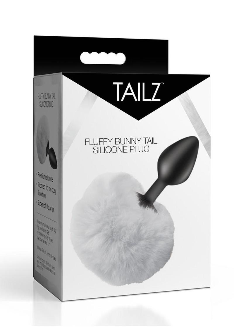 Fluffy animal tail plug in pink fur styled with sexy lingerie for playful erotic presentation