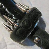 Unique BDSM gear with metal spikes and leather details
