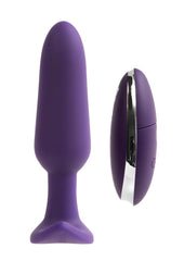 Purple silicone butt plug with metallic ring on a white background