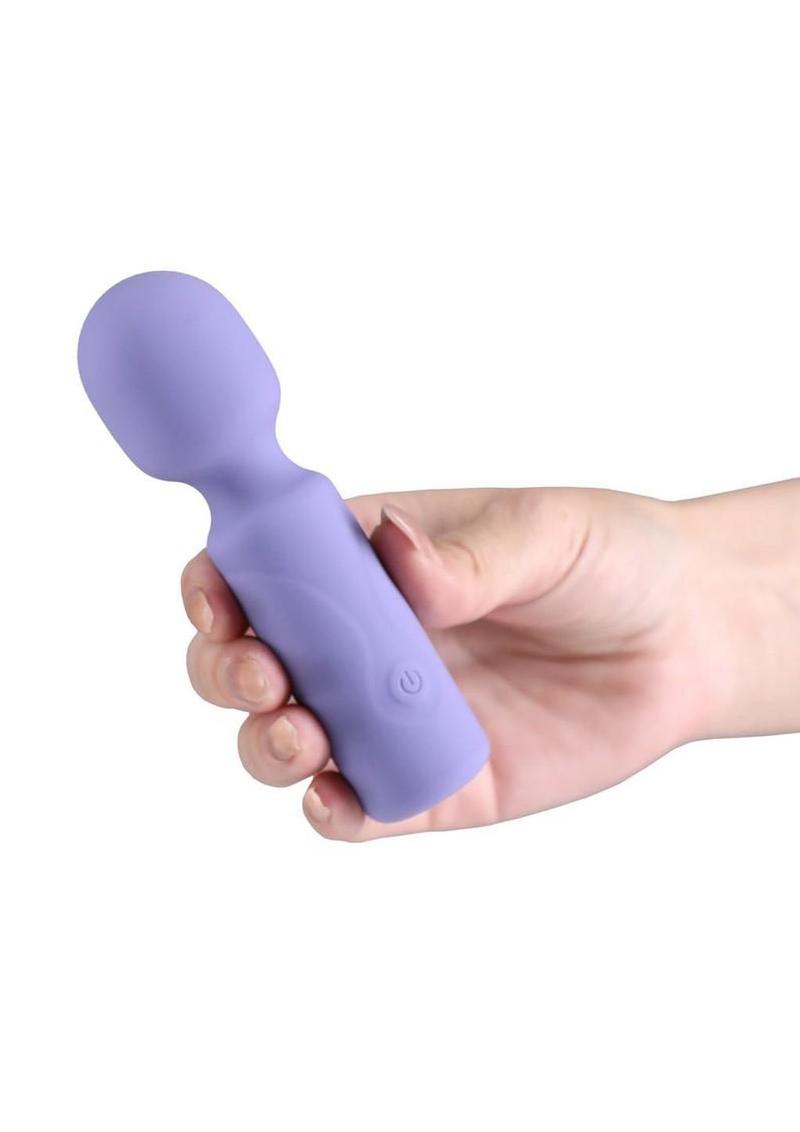 mini wand vibrator held in hand
