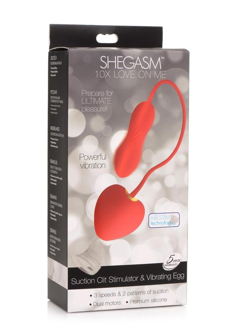 Shegasm Love On Me Rechargeable Silicone Suction Clit Stimulator and Vibrating Egg - Red